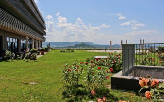 This restaurant terrace at the 4-star Achalm Restaurant in Reutlingen provides a wonderful view and conceals the underground car park below. Roof garden with lawn and roses